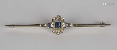 A white gold, platinum, sapphire and diamond bar brooch of Art Deco design, detailed '18ct & PT',