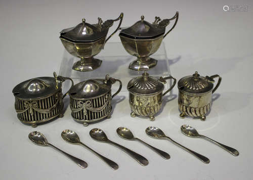 A pair of late Victorian silver octagonal mustards, each raised on an octagonal foot, Birmingham