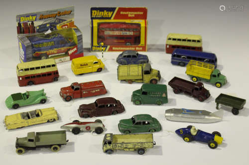 A collection of Dinky Toys cars, commercial vehicles and public transport vehicles, including a