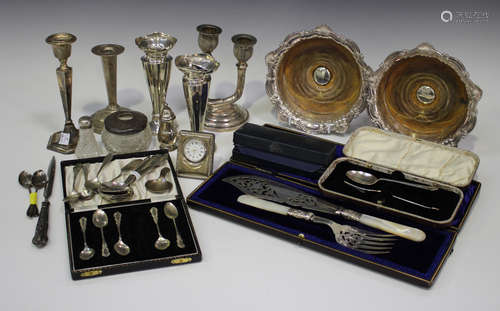 A small group of mostly silver items, including a pair of George VI silver spill vases, Chester 1946