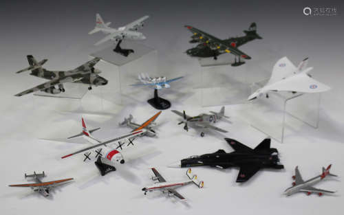 A collection of model civilian and military aircraft, including a Hercules C-130 US Coast Guard, a