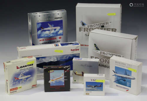 A collection of die-cast model commercial and military aircraft, including a Herpa 1:200 scale US