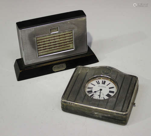 A George V silver mounted travelling watch case with hinged lid and overall engine turned