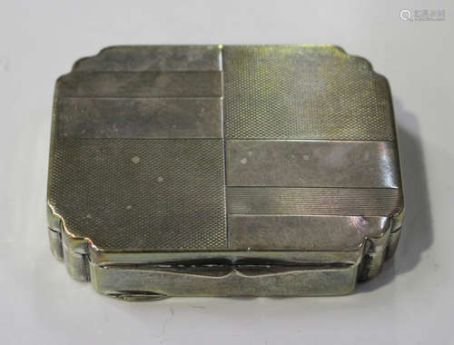 A Continental .830 silver shaped rectangular snuff box with fluted corners and engine turned