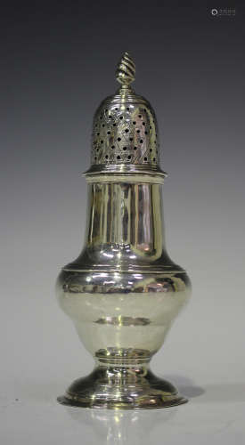 A George III silver pepper caster of ogee baluster form, the pierced dome cover with spiral