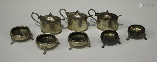 Three George V silver and oval mustards with hinged lids, Chester 1913 by Stokes & Ireland Ltd,