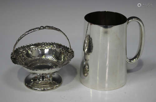 A late Victorian silver tankard of plain tapered cylindrical form, London 1884 by Martin, Hall & Co,