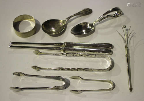 A Georg Jensen sterling lily pattern caddy spoon, import mark London 1926, length 11cm, together