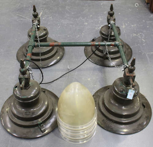 A large set of four late 19th century green painted cast iron and tin ceiling lights, by D.W.