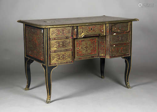 A French Louis XIV red stained tortoiseshell and brass boulle work bureau Mazarin, the foliate