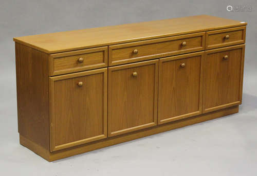 A mid/late 20th century G-Plan teak sideboard, fitted with three drawers above cupboards, on a