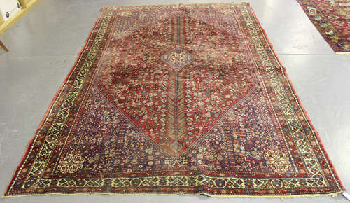 A Senneh carpet, North-west Persia, mid-20th century, the ink blue field with a pole medallion,