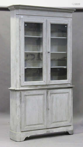 A late 19th/early 20th century grey painted pine kitchen cabinet, fitted with a pair of glazed doors