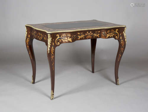 A mid-Victorian mahogany and marquetry inlaid serpentine shaped bureau plat of small proportions,