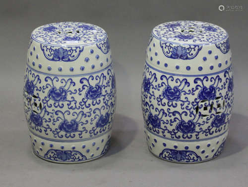 A pair of modern Chinese blue and white porcelain barrel-shaped garden seats, decorated with overall