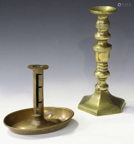 A Victorian brass candlestick of seamed construction by 'J. Smyth', the hexagonal base inscribed '