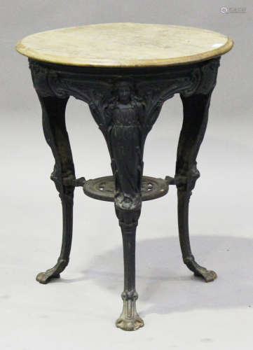 A late Victorian cast iron pub table, the later circular top on an entwined dolphin support