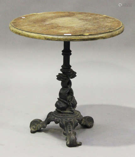 A late Victorian cast iron commemorative Boer War pub table, the later circular top raised on
