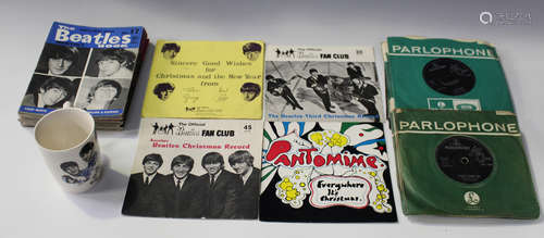 A collection of Beatles related items, including four Fan Club Flexidisc Christmas Records (one