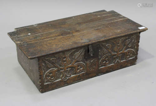 A late 17th century oak bible box, the removable lid above a carved front, both sides inscribed '