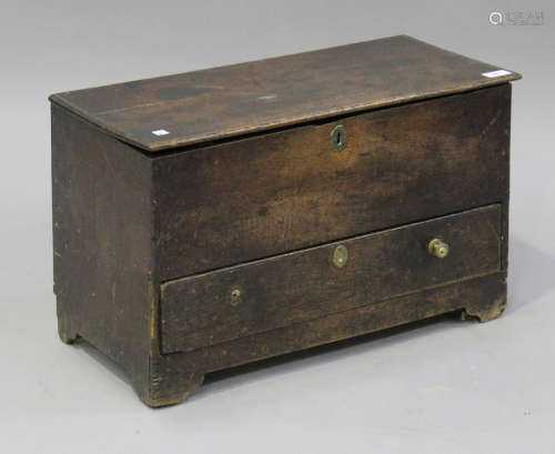 A small 18th century oak mule chest, the removable lid above a drawer, on bracket feet, height 37cm,