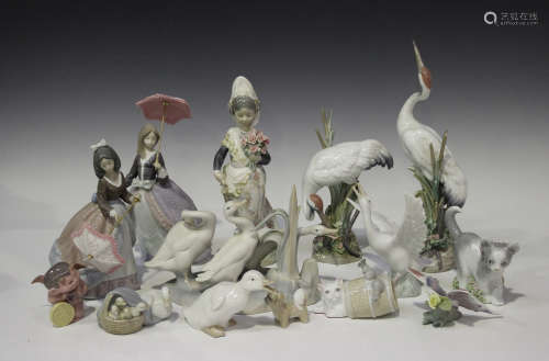 Ten Lladro porcelain figures, including Bowing Crane, No. 1613, Dancing Crane, No. 1614, Angela, No.