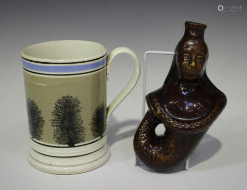 A mocha ware tankard, 19th century, with typical banded decoration, height 14.8cm, together with a