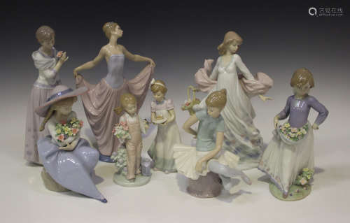 Eight Lladro porcelain figures, including Fragrant Bouquet, No. 5862, Precious Petals, No. 5894,