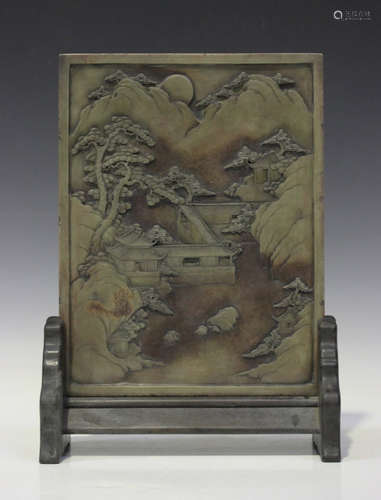 A Chinese inkstone table screen and hardwood stand, 20th century, the rectangular plaque carved in