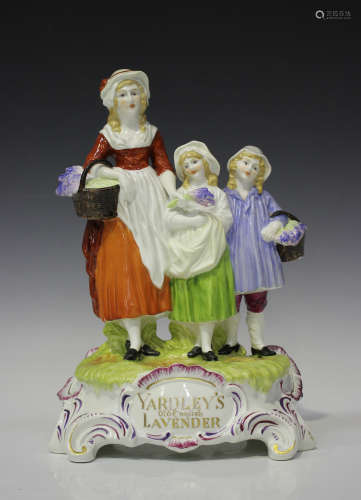 A large Dresden porcelain 'Yardley's Old English Lavender' advertising figure group, height 30cm.