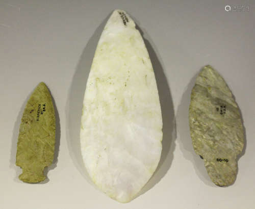 A group of three American chipped flint arrow or spear heads, one inscribed 'Ohio U.S.A.' and