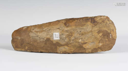 A large Danish Neolithic chipped stone axe, bearing 'F.S. Clark Collection' label, detailed '