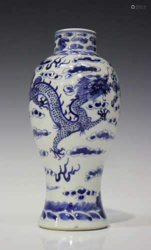 A Chinese blue and white porcelain baluster vase, late 19th century, painted with two dragons