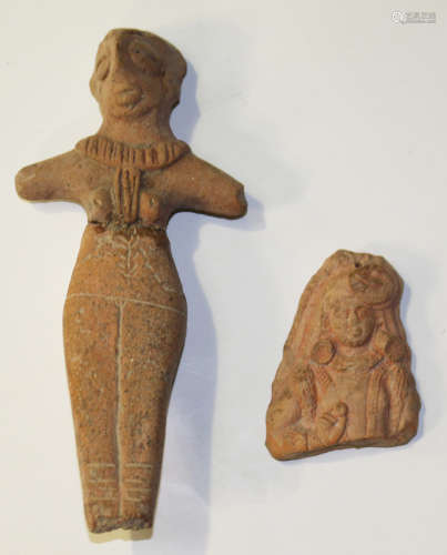 A pre-Columbian Mexican Colima buff terracotta female figure, circa 250BC-250AD, modelled