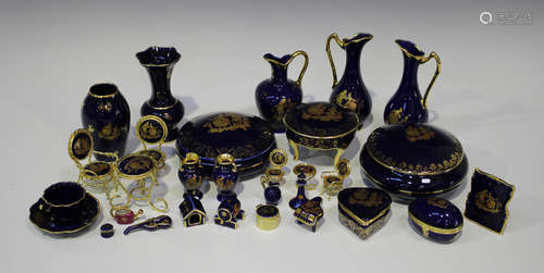 A large collection of gilt decorated cobalt blue Limoges porcelain wares, 20th century, including