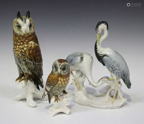 A Karl Ens model of a long-eared owl, height 26cm, a similar smaller Ens owl model, height 15cm, and