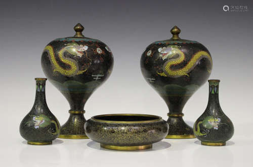 A pair of Chinese cloisonné jars and covers, early 20th century, each of globular form on a tapering