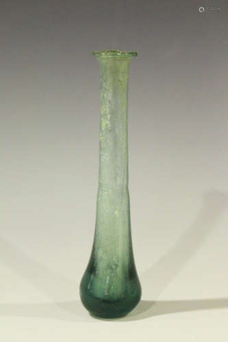A Roman glass teardrop perfume phial of elongated bottle form with bulbous end, length 11.8cm.