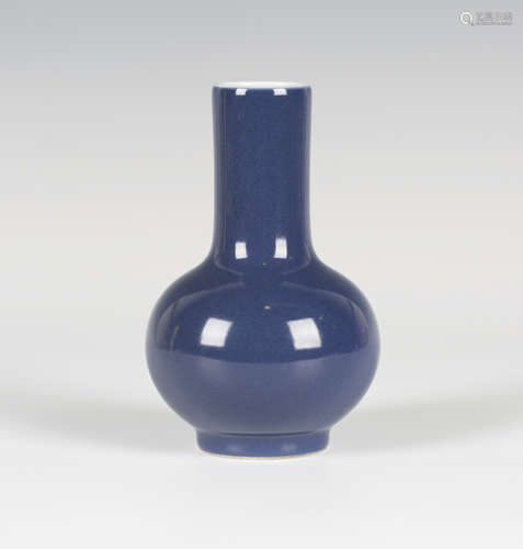 A Chinese blue glazed porcelain bottle vase, mark of Qianlong but probably later, the globular