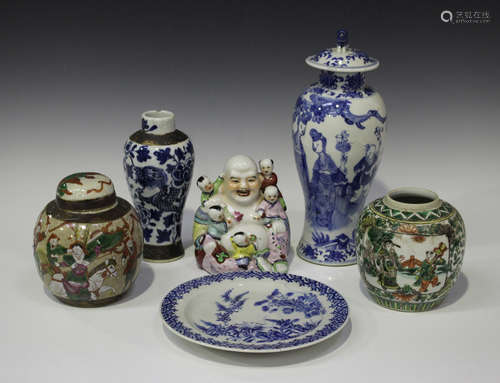 A Chinese blue and white porcelain vase and cover, mark of Kangxi but late 19th century, painted