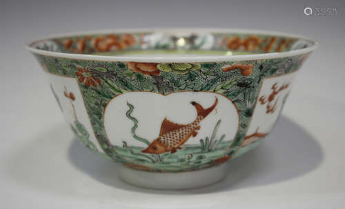 A Chinese famille verte porcelain circular bowl, Kangxi period, with gently everted rim, the