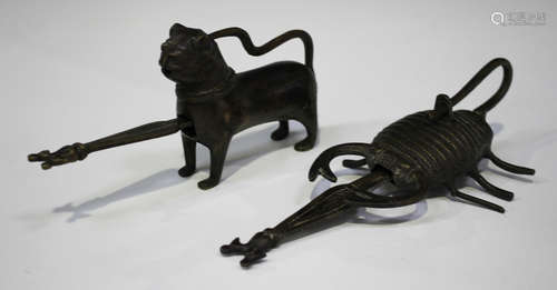 An Indian brass padlock and key, late 19th century, modelled in the form of a lion, length including