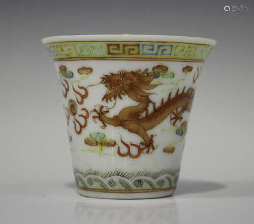 A Chinese porcelain wine cup, mark of Guangxu but probably later, the flared body painted with two