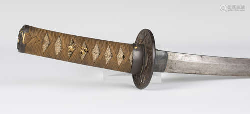 A Japanese wakizashi (short sword), 19th century, with slightly curved single-edged blade, the