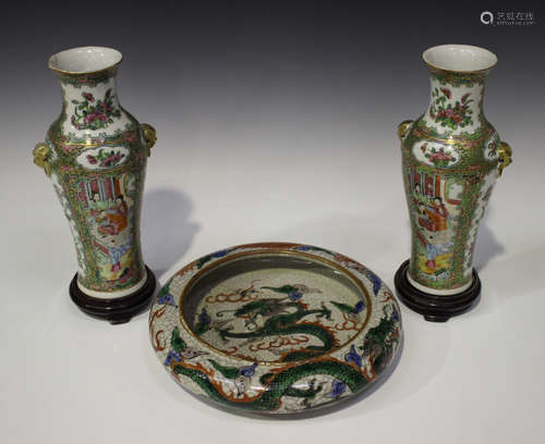 A pair of Chinese Canton famille rose porcelain vases, late 19th century, each slender baluster body