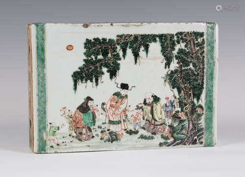 A rare Chinese famille verte porcelain brick form pillow, Kangxi period, one side painted with three