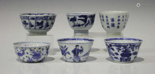 A group of six Chinese blue and white porcelain wine cups/tea bowls, 18th century, with variously