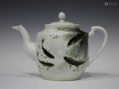 A Chinese porcelain teapot and cover, probably Republic period, the body painted with four fish