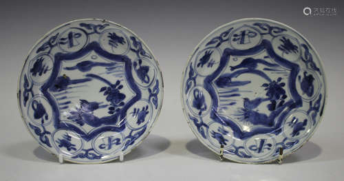 A pair of Chinese blue and white Kraak porcelain saucer dishes, late Ming dynasty, probably Wanli