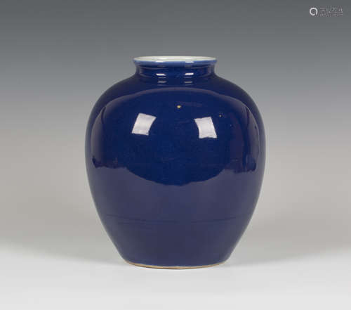 A Chinese blue glazed porcelain vase, mark and period of Qianlong, of stout ovoid form, covered in a